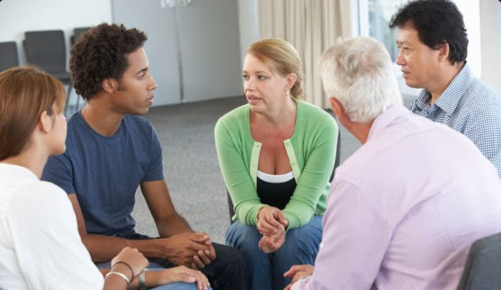 People taking part in a group discussion