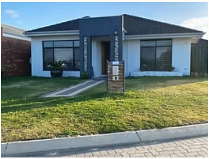 Front exterior of a single-storey suburban home with a neat lawn